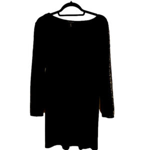 Tahari small black dress with open lace inserts in sleeve